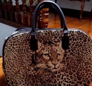 Maleta de mano con estampado de leopardo