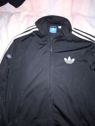 Tuta Adidas nera con strisce bianche