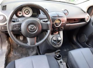 8102098 b25d58580c02 maneta elevalunas mazda 2 1.4