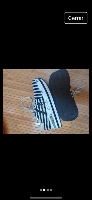 Zapatillas deportivas Premiata rayas blancas y neg