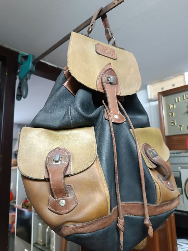 Zaino vintage in pelle nera e marrone