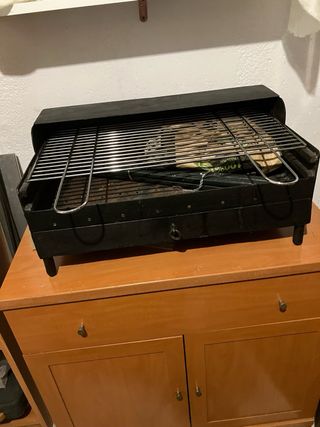 Barbecue a carbonella metallizzata nera 60x35 e 110