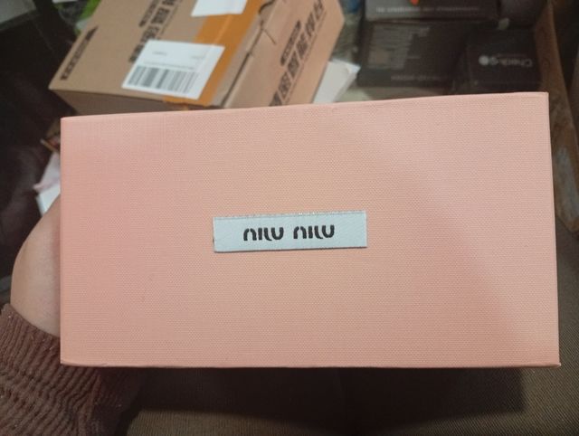 Gafas de sol Miu Miu negras y rosas