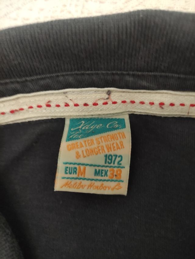 Polo manga larga negro hombre