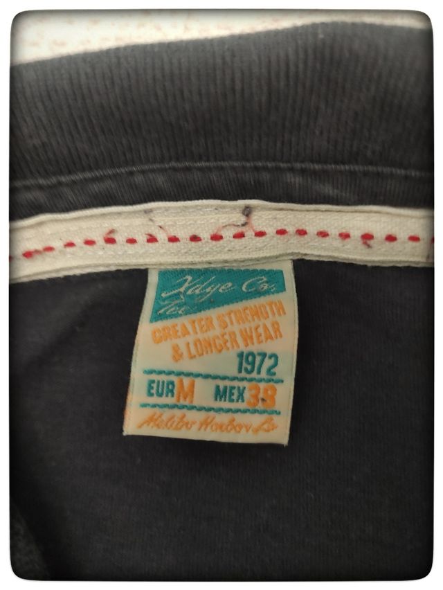 Polo manga larga negro hombre