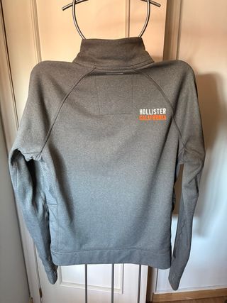 Chaqueta Hollister gris con cremallera naranja