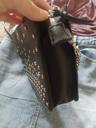 Bolso Parfois negro con estrellas plateadas