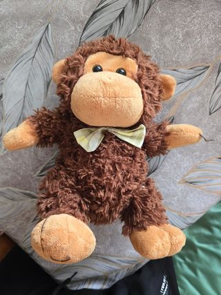 Peluche scimmietta con fiocco