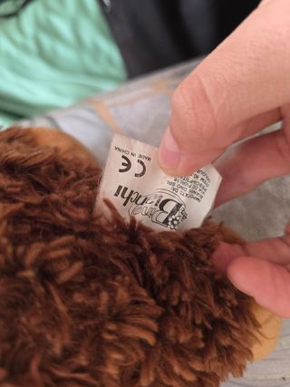 Peluche scimmietta con fiocco