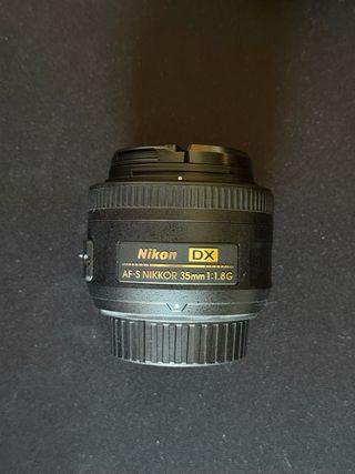 Cámara Nikon D5100 + objetivos + flash + bolsa