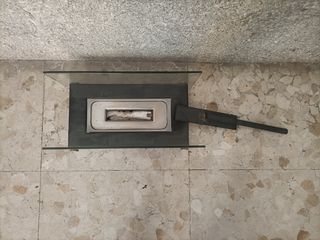 Chimenea de cristal y metal