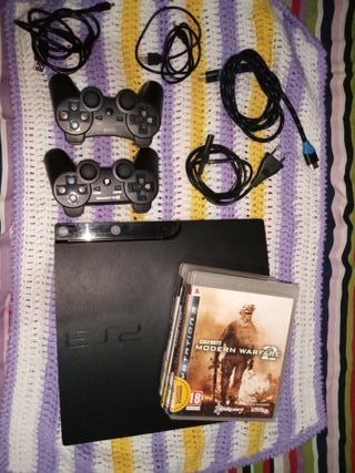 PlayStation 3 Negra con Juegos y Mandos