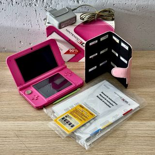 Nintendo 3DS XL Rosa + scatola caricatore e giochi