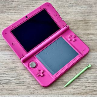 Nintendo 3DS XL Rosa + scatola caricatore e giochi