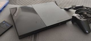 PlayStation 2 Negra + Mando + 3 Juegos