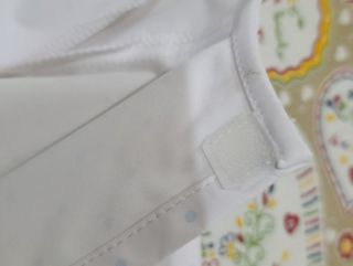 Babero Gocco blanco con puntos azules ideal evento