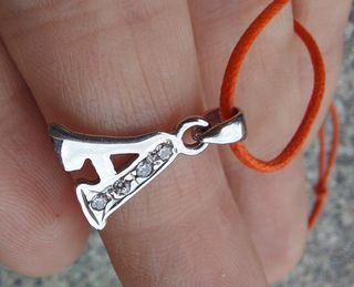 Ciondolo lettera A oro bianco 750 con zirconi