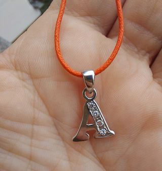 Ciondolo lettera A oro bianco 750 con zirconi