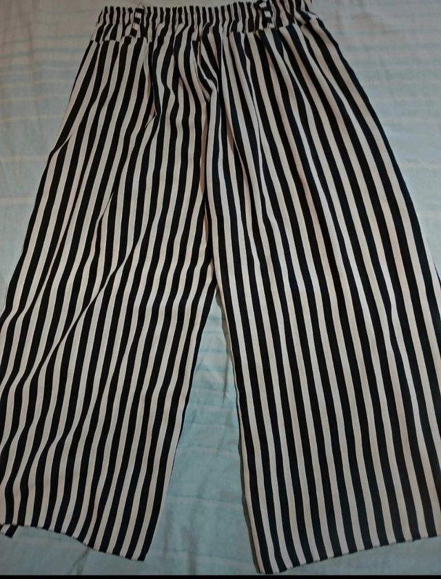 Pantaloni a palazzo righe bianche e nere