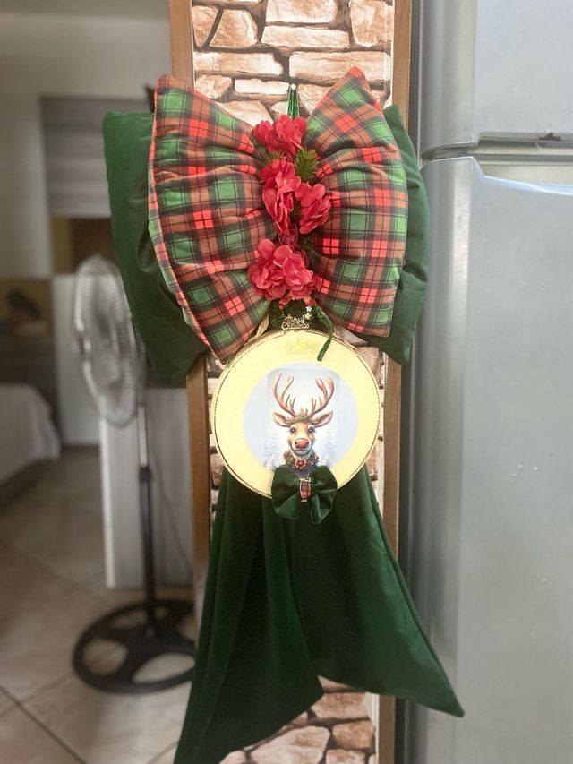 Fiocco decorativo con tamburo e renna