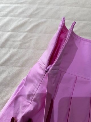 Falda corta plisada rosa
