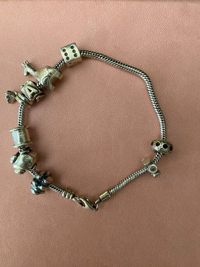 Pulsera Pandora original con 9 charms