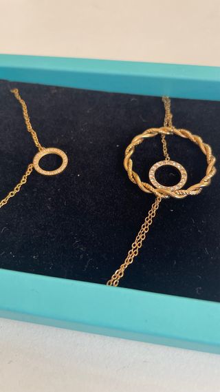 Conjunto collar y pulsera dorados Cotigo