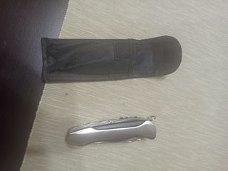 Navaja multiusos de acero inoxidable