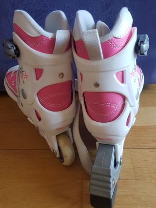 Patines en línea rosas y blancos para niña