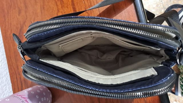 Vendo  bolso   como nuevo color azul escoro  liqui