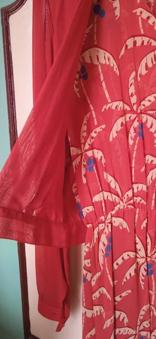 Abito arancione con stampa palme