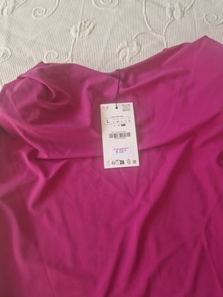 Blusa elegante con hombreras talla L