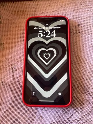 iPhone X Negro con funda roja