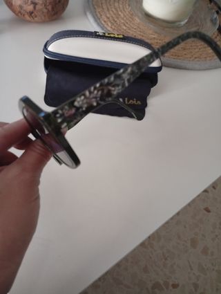 Gafas de sol Ray-Ban verdes y moradas.50€