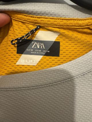 Camiseta deportiva Zara hombre gris y amarilla