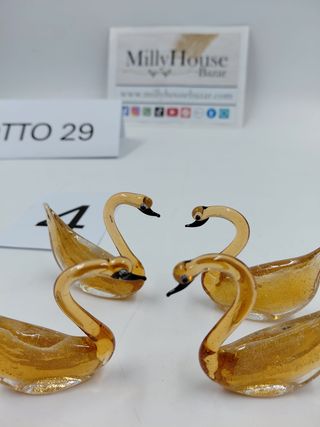 Lotto 4 cigni in vetro ambra