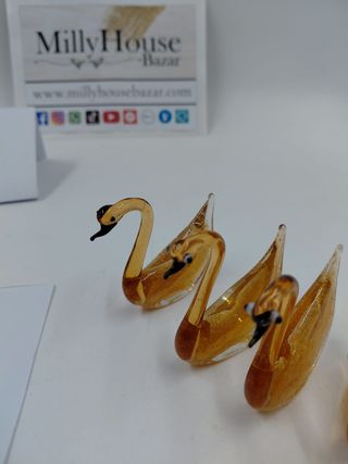 Lotto 4 cigni in vetro ambra