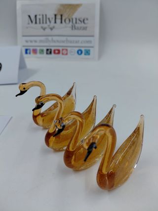 Lotto 4 cigni in vetro ambra