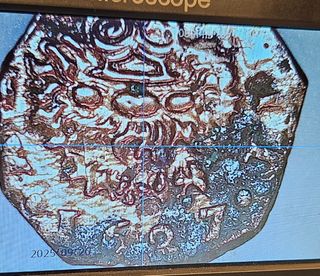 Moneda antigua 1.627