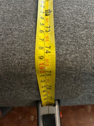 Sofá cama gris con almacenaje