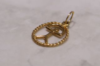 COLGANTE INDALO, ORO 18K/0.9