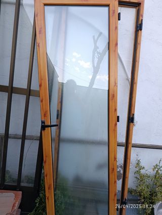 Puerta aluminio doble cristal climalit