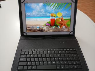Tablet Asus 10 con funda teclado incluida.