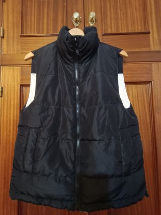 Chaleco reversible cremallera y corchetes