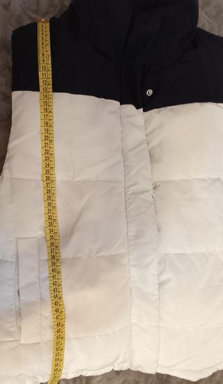 Chaleco reversible cremallera y corchetes