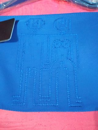 Bolso Desigual azul con corazón y símbolo de la pa