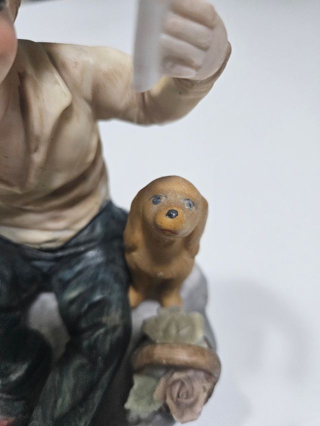 Statuina ceramica ragazzo e cane