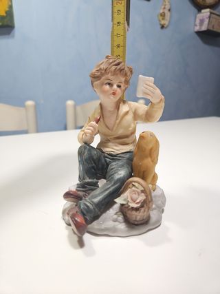 Statuina ceramica ragazzo e cane