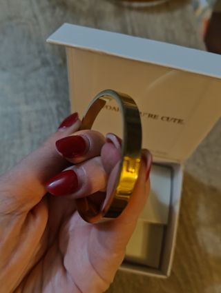 Pulsera rígida de oro y acero