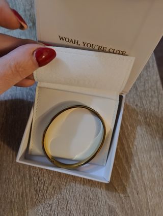 Pulsera rígida de oro y acero